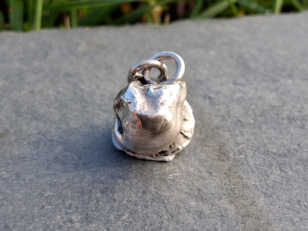 Hollow water cast pendant