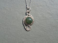 Twisted moss agate pendant