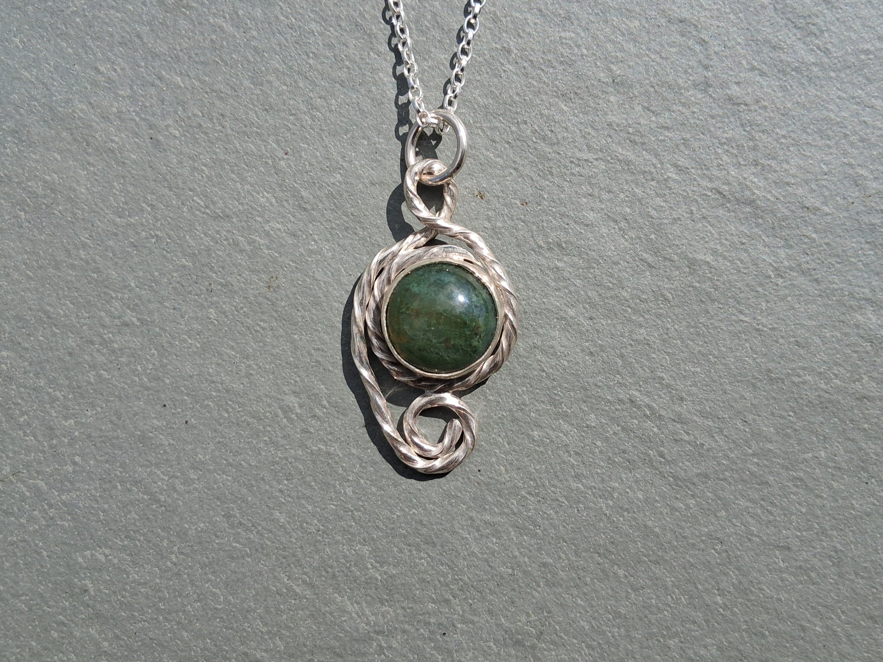 Twisted moss agate pendant