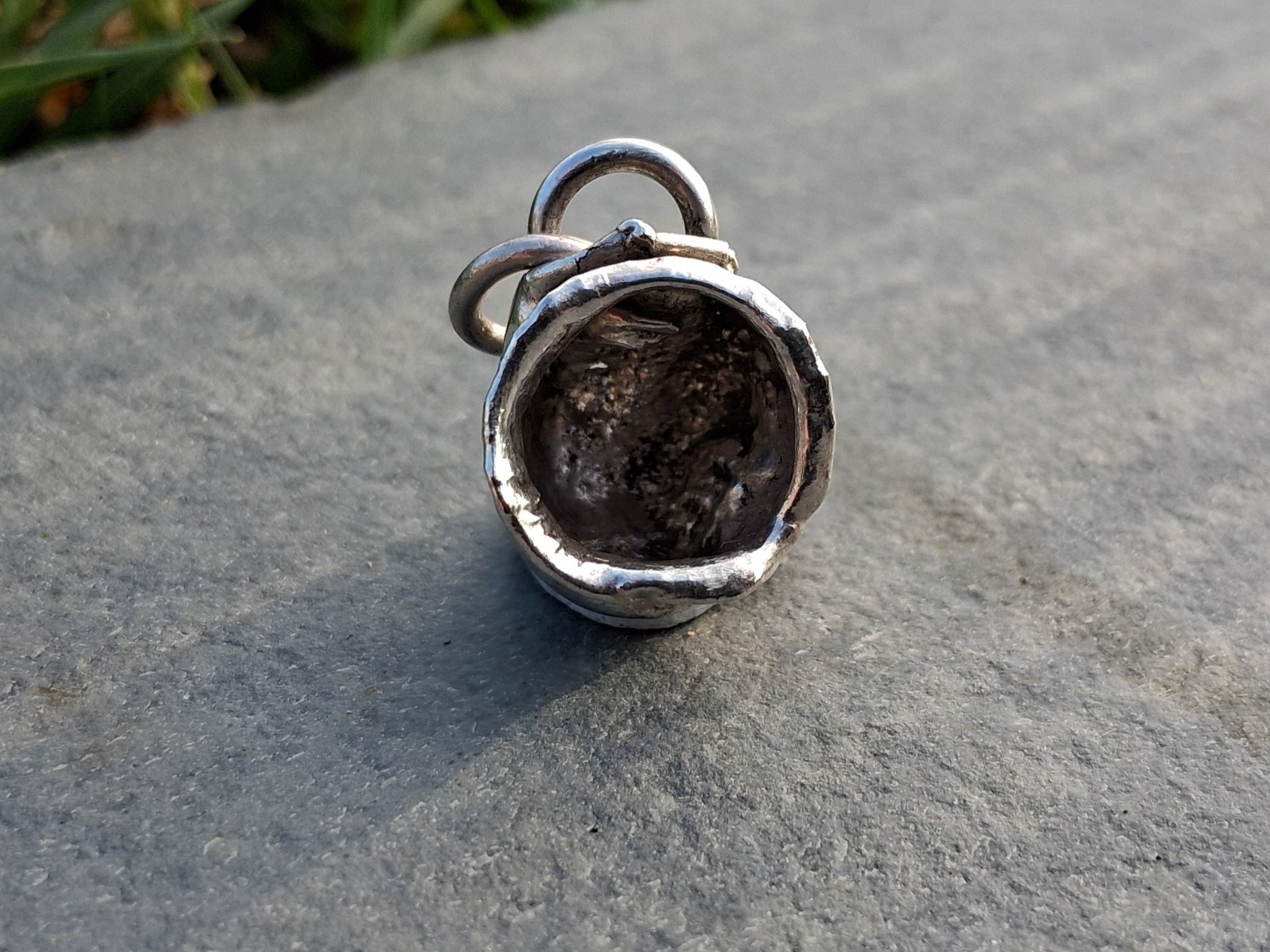 Hollow water cast pendant