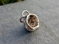 Hollow water cast pendant