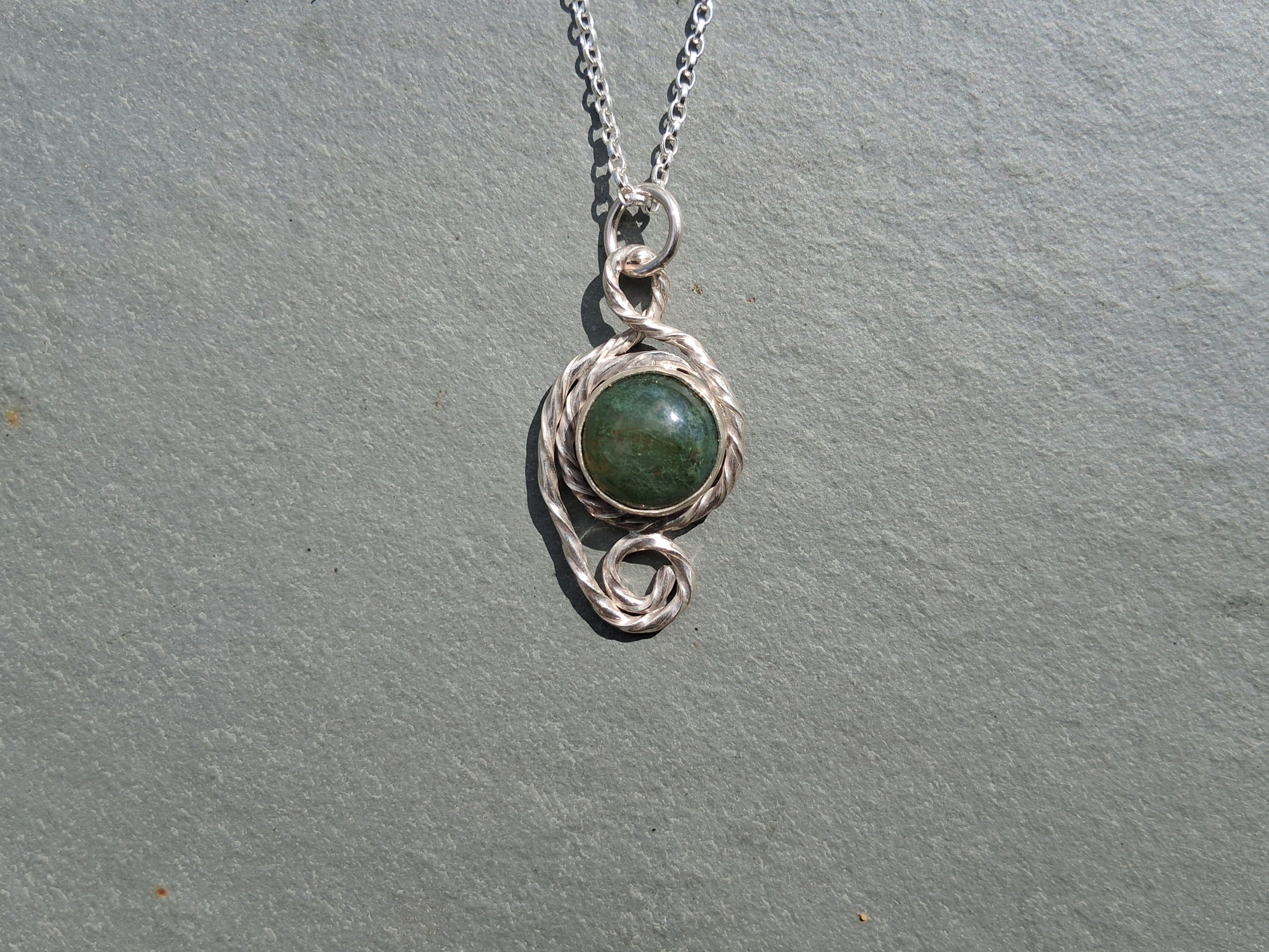 Twisted moss agate pendant