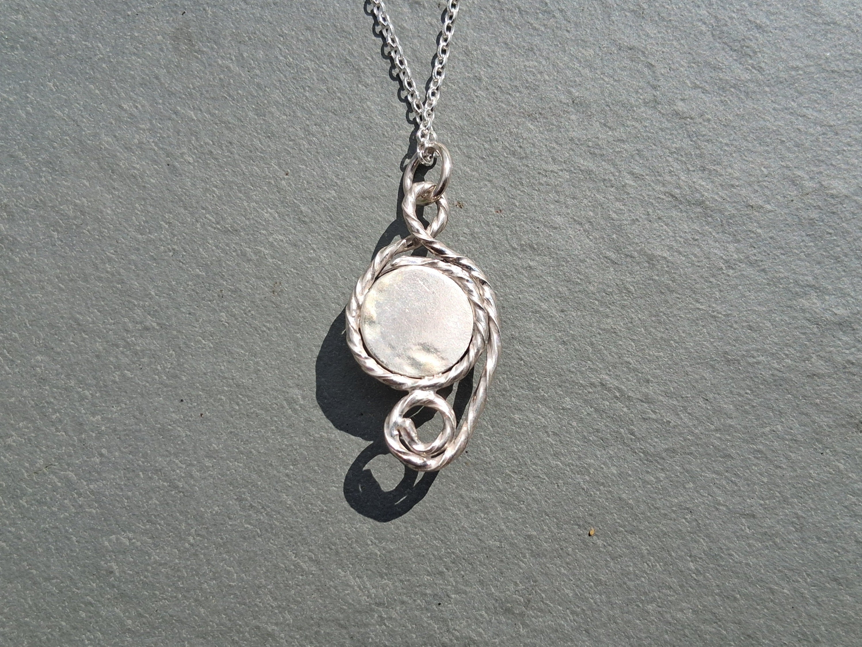 Twisted moss agate pendant